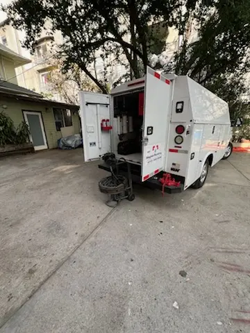 Magnet Plumbing service vehicle on-site for Grease Trap Cleaning in Beverly Hills